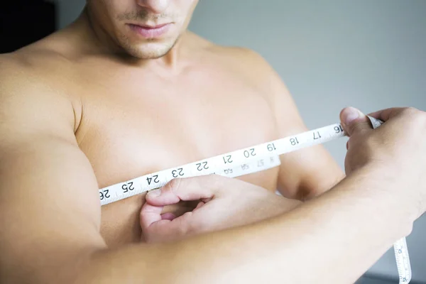 Man Measuring His Chest — Stock Photo, Image