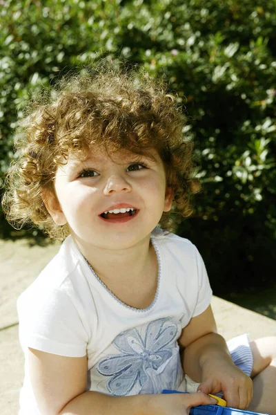 Cute Little Young Girl Playing Her Toy — Stock Photo, Image