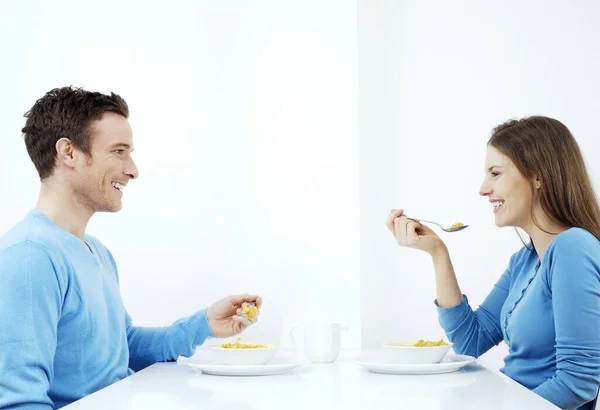 Couple Having Breakfast Together Stock Photo