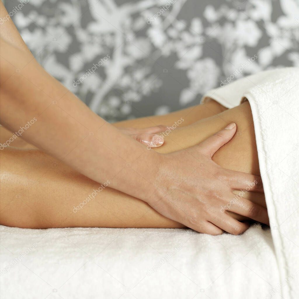 Woman enjoying a leg massage