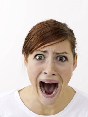 Terrified woman on white background  clipart