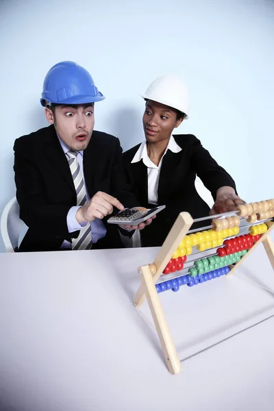 Businessman Shock While Calculating Businesswoman Looking Him — Stock Photo, Image