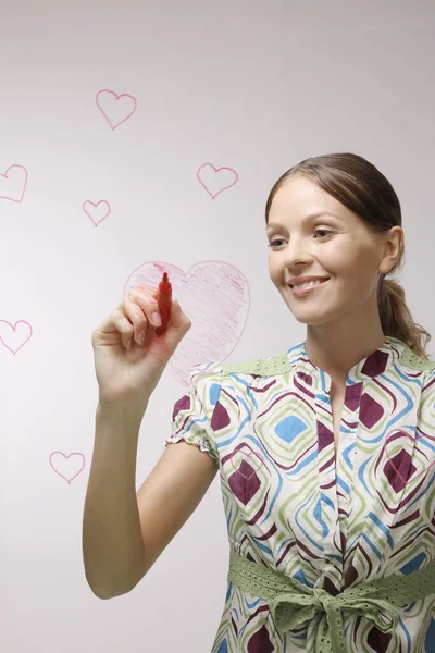 Mujer Dibujando Corazones Pared Vidrio —  Fotos de Stock