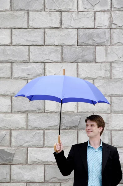 Businessman Holding Umbrella — Stock Photo, Image