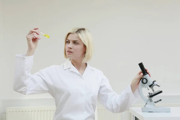 Woman Examining Liquid Test Tube — Stock Photo, Image