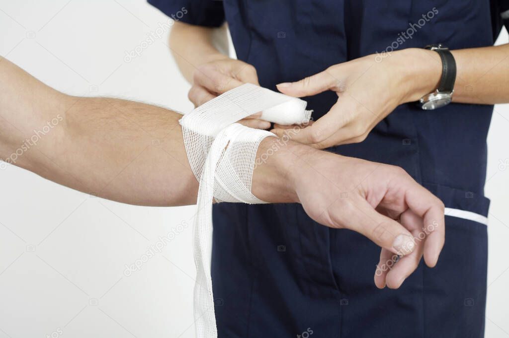 Female nurse treating a patient