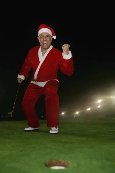 Mann Weihnachtsmannanzug Jubelt Auf Golfplatz — Stockfoto