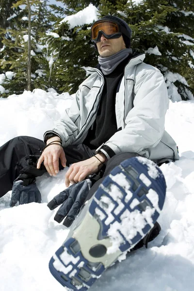 Man Sitting Snowy Ground — Stock Photo, Image