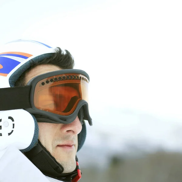 Man in ski helmet and goggles