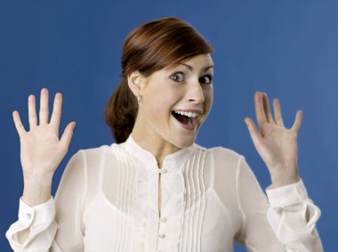 Surprised woman, studio shot clipart