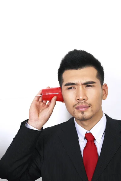 Бизнесмен Играет Пластиковым Телефоном — стоковое фото