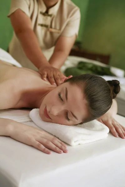 Woman Enjoying Back Massage — Stock Photo, Image