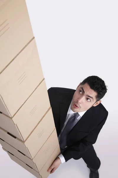 Empresario Llevando Cajas Apiladas — Foto de Stock