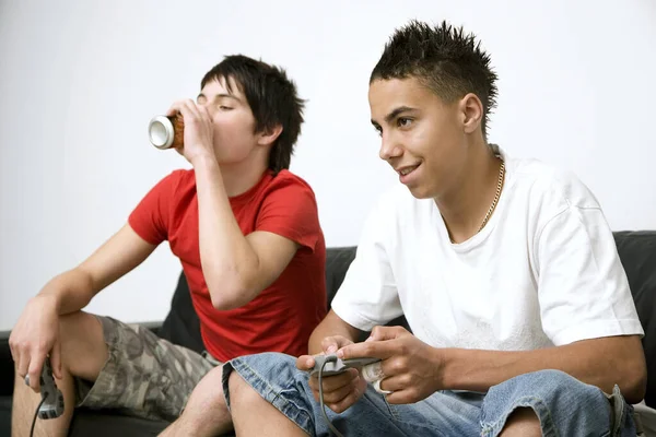 Boy Playing Video Game Console Another Boy Drinking — Stock Photo, Image