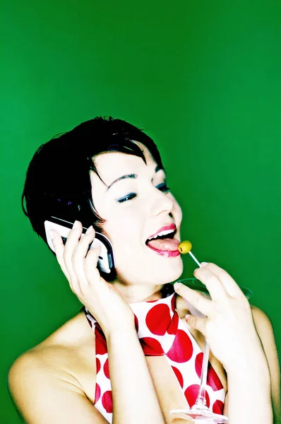 Woman Red White Polka Dots Dress Eating Fruit While Talking — Stock Photo, Image