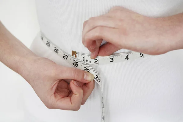 Close Woman Measuring Her Waistline — Stock Photo, Image