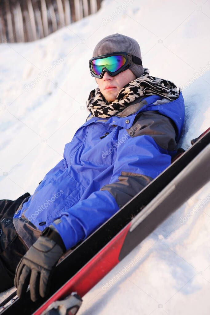 Man resting after skiing