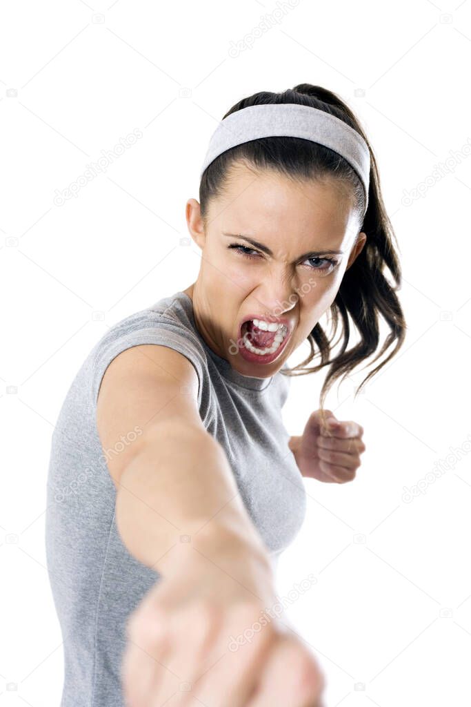 Woman shouting while punching