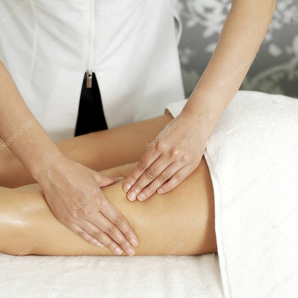 Woman enjoying a leg massage