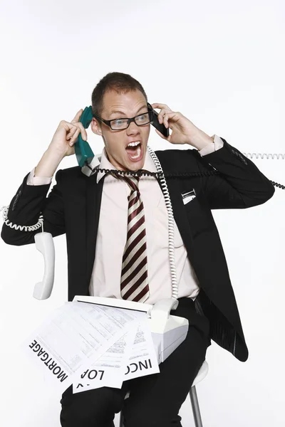 Zakenman Worstelt Met Papierwerk Telefoontjes — Stockfoto