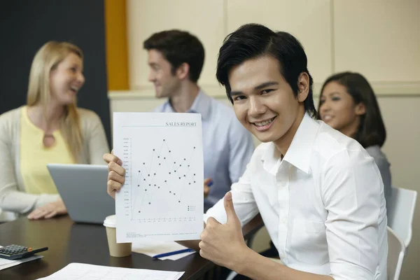 Businessman Showing Sales Report — Stock Photo, Image