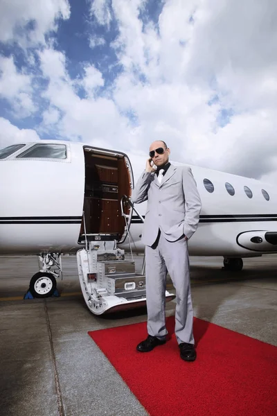 Man Headset Standing Private Jet — Stock Photo, Image