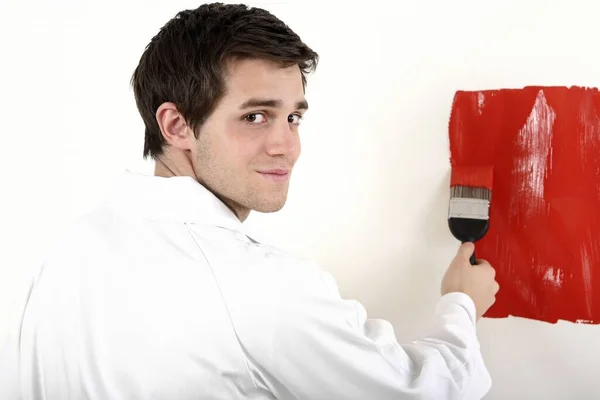 Man Painting Wall Red — Stock Photo, Image