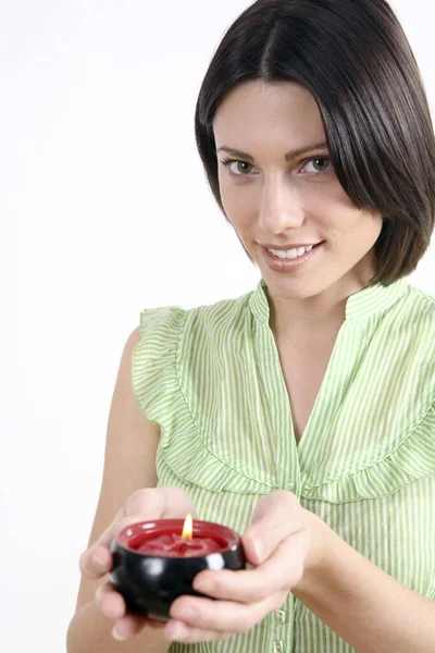 Mujer Sosteniendo Vela Perfumada Encendida —  Fotos de Stock