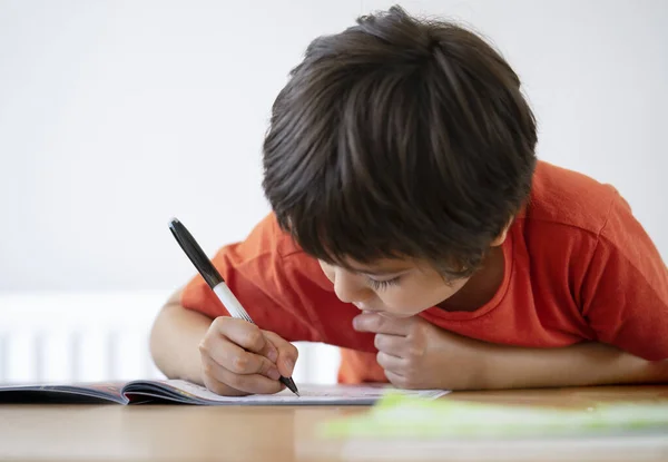 Selective Focus School Kid Boy Siting Table Doing Homework White — Stock Photo, Image