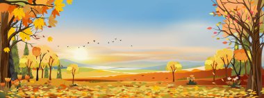Günbatımı, mavi ve pembe gökyüzü, sonbaharın ortasında, tarlaları, dağları, yaprakları turuncu yapraklarla kaplı kırsal alanların sonbahar manzaraları. Sonbahar mevsiminde Harikalar Diyarı