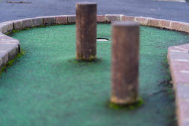 Crazy golf holes outside clipart