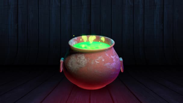 沸騰した緑のポーションを持つ魔女の釜。魔女のポーズハロウィンの背景 — ストック動画