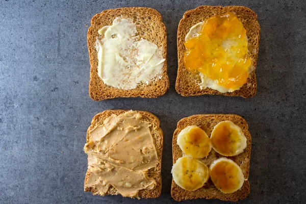 Sweet Breakfast Top View Photo Toasts Different Toppings Peanut Butter — Stock Photo, Image