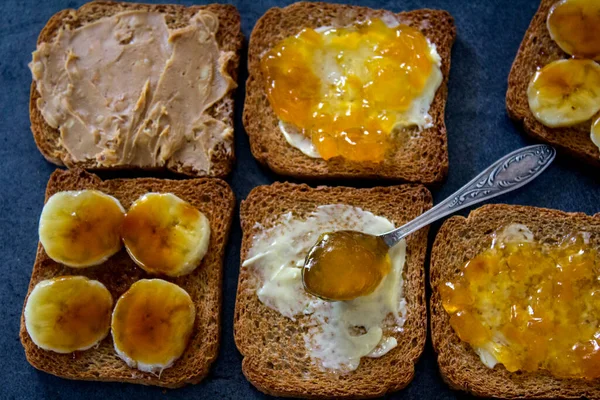Sweet Breakfast Top View Photo Toasts Different Toppings Peanut Butter — Stock Photo, Image