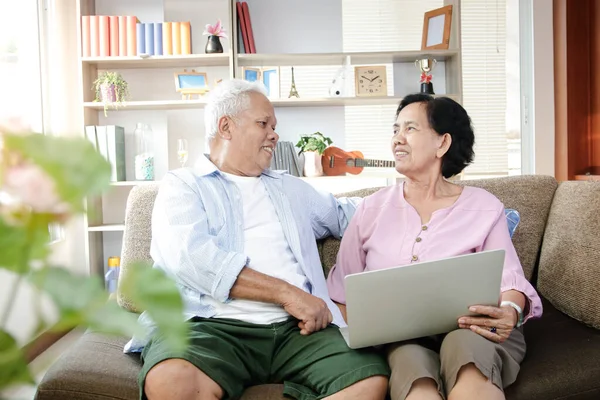 Elderly Asian Couple Sitting Sofa Watching Media Online Laptop Living — Stock Photo, Image