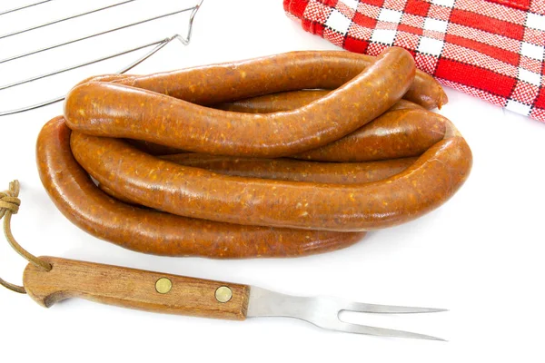 birkaç merguez (baharatlı sosisler), Barbekü