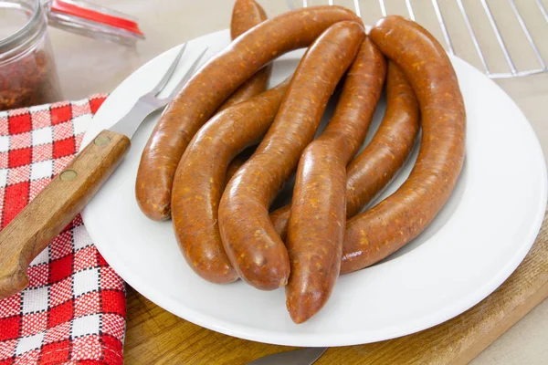 birkaç merguez (baharatlı sosisler), Barbekü