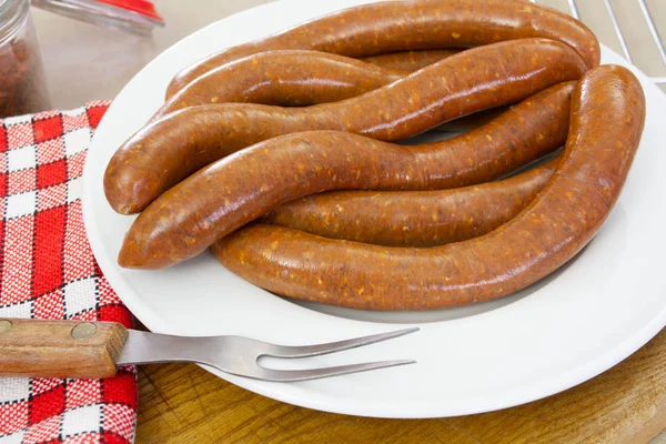 birkaç merguez (baharatlı sosisler), Barbekü