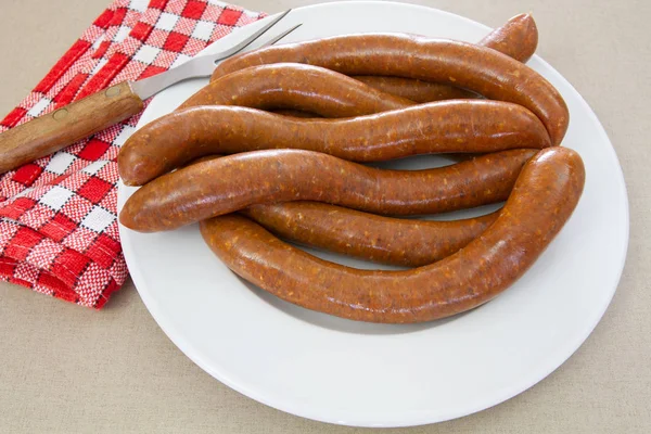 birkaç merguez (baharatlı sosisler), Barbekü