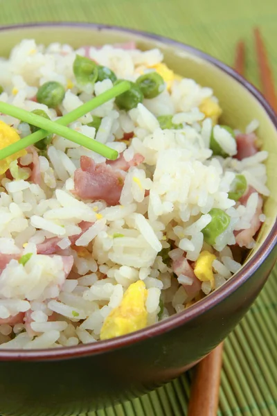 Cantonese rice dish with chopsticks