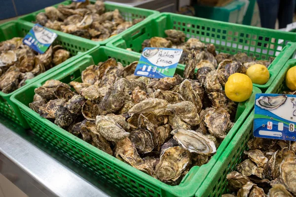 sale of oysters on a market stall