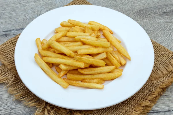Prato Batatas Fritas Francesas Uma Mesa Madeira — Fotografia de Stock