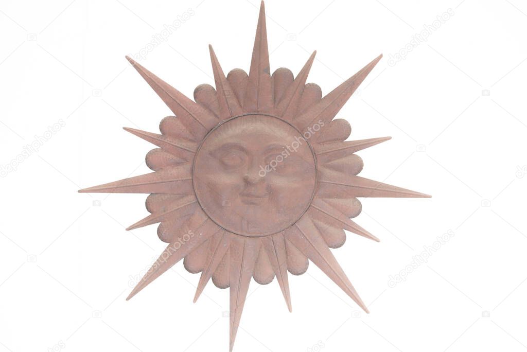 red brown sun symbol with face against white and bright background