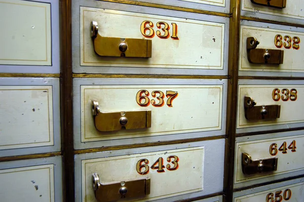 safe deposit box or safe deposit locker, golden numbers on old boxes
