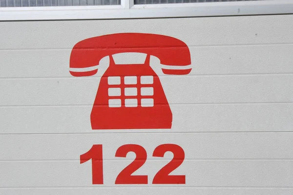 Червоний Телефонний Ікона Номер 122 Відділ Аварійного Вогню Австрії — стокове фото