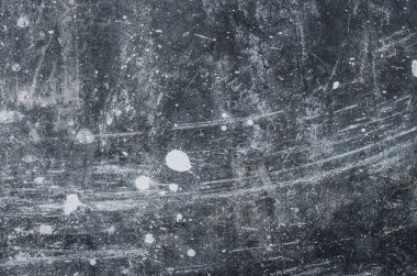 Siyah arka plan. Beyaz lekeli siyah taş bir duvarın dokusu.