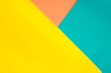 Üç renkli kağıt arkaplan. Sarı, mavi ve pembe kağıt geometrik arkaplan