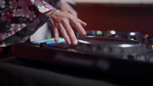 Slow Motion Asian Women Hand Turning Disc Turntable Stand Night — стокове відео