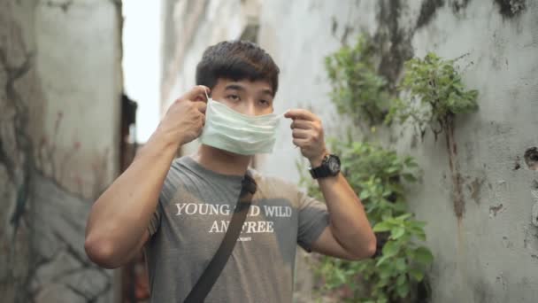Slow Motion Asian Young Man Wearing Surgical Mask Covid Corona — Stock Video