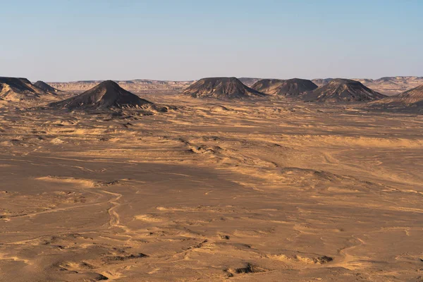 Landscape of mountains and desert in Black desert, Egypt, Africa